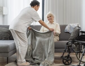 doctor-taking-care-senior-woman-home (1)